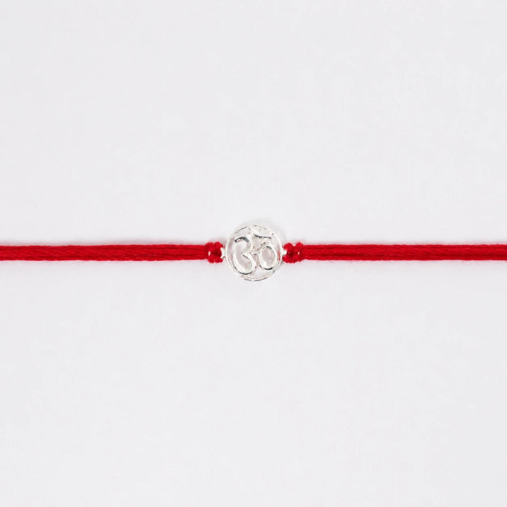 silver om rakhi