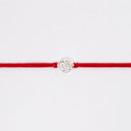 silver om rakhi