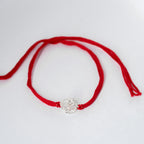 silver om rakhi