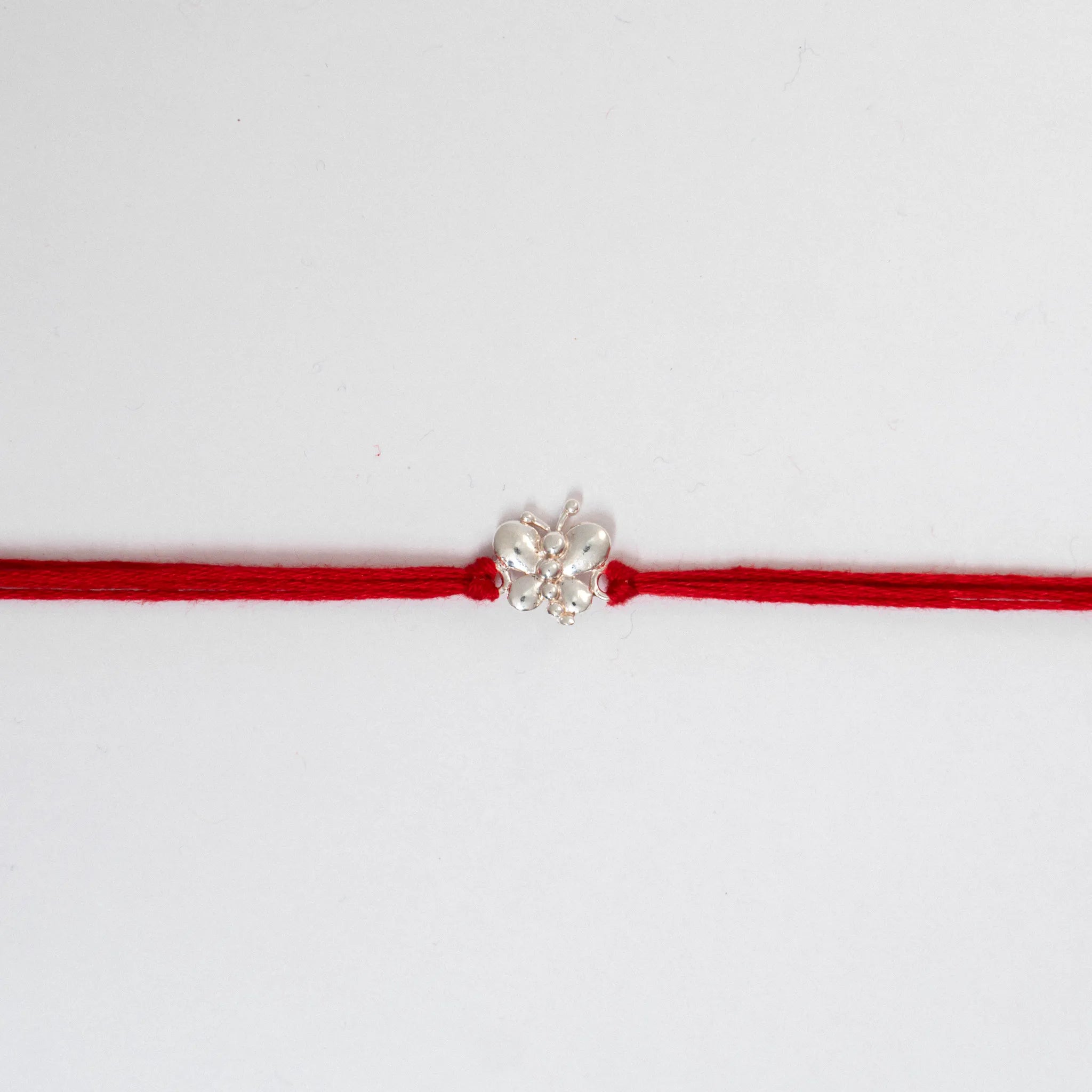 silver butterfly rakhi for brother
