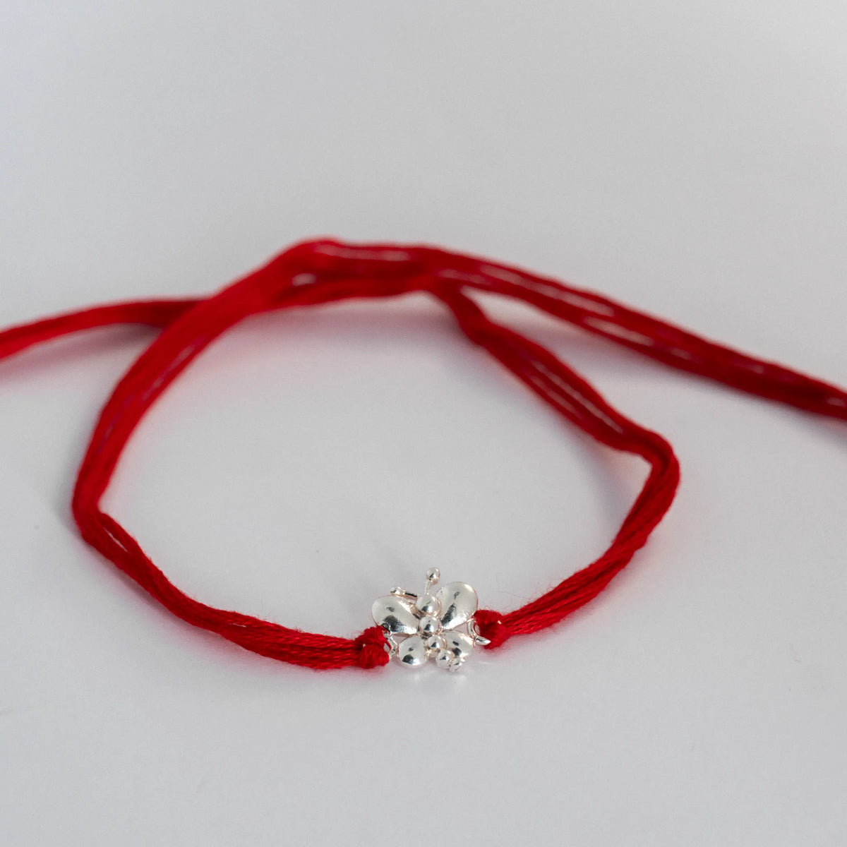 silver butterfly rakhi for brother