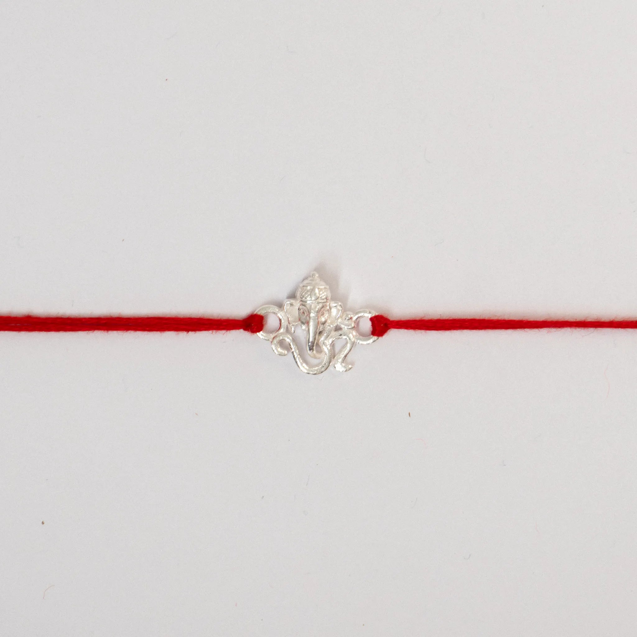 925 Sterling Silver Lord Ganesha Rakhi for Brother with Red Thread