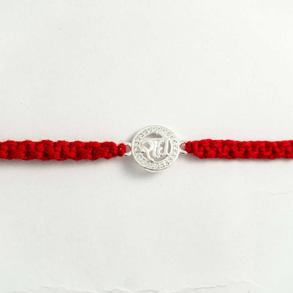 Silver Radha Rakhi for Brother with Handcrafted Red Thread