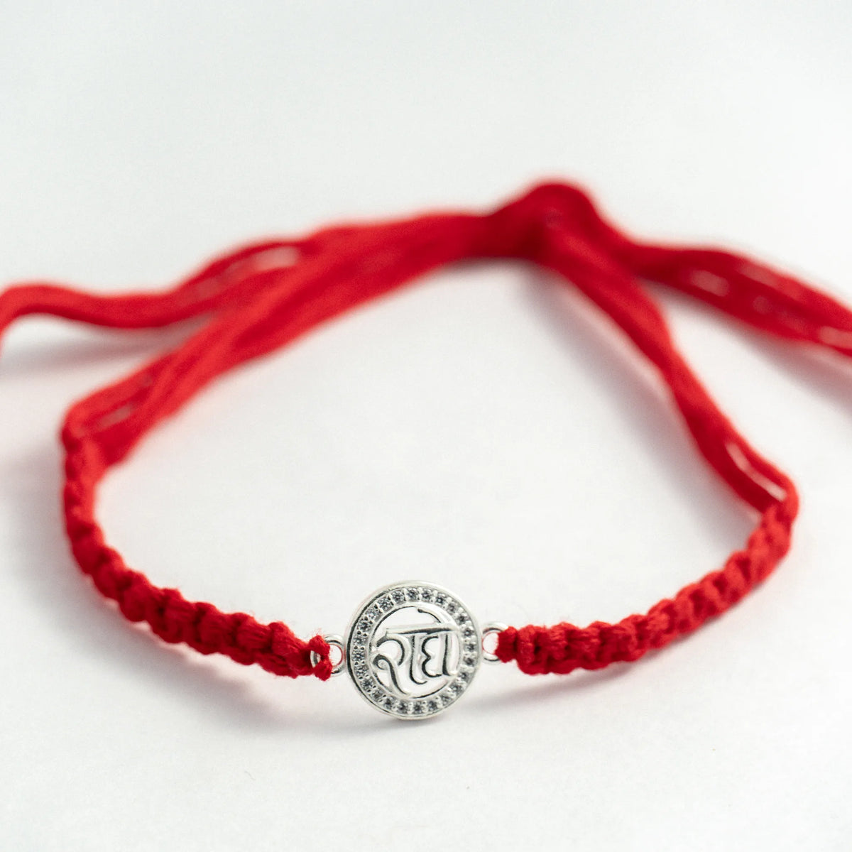 Silver Radha Rakhi for Brother