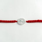 Silver Shiv Rakhi for Brother with Handcrafted Red Thread
