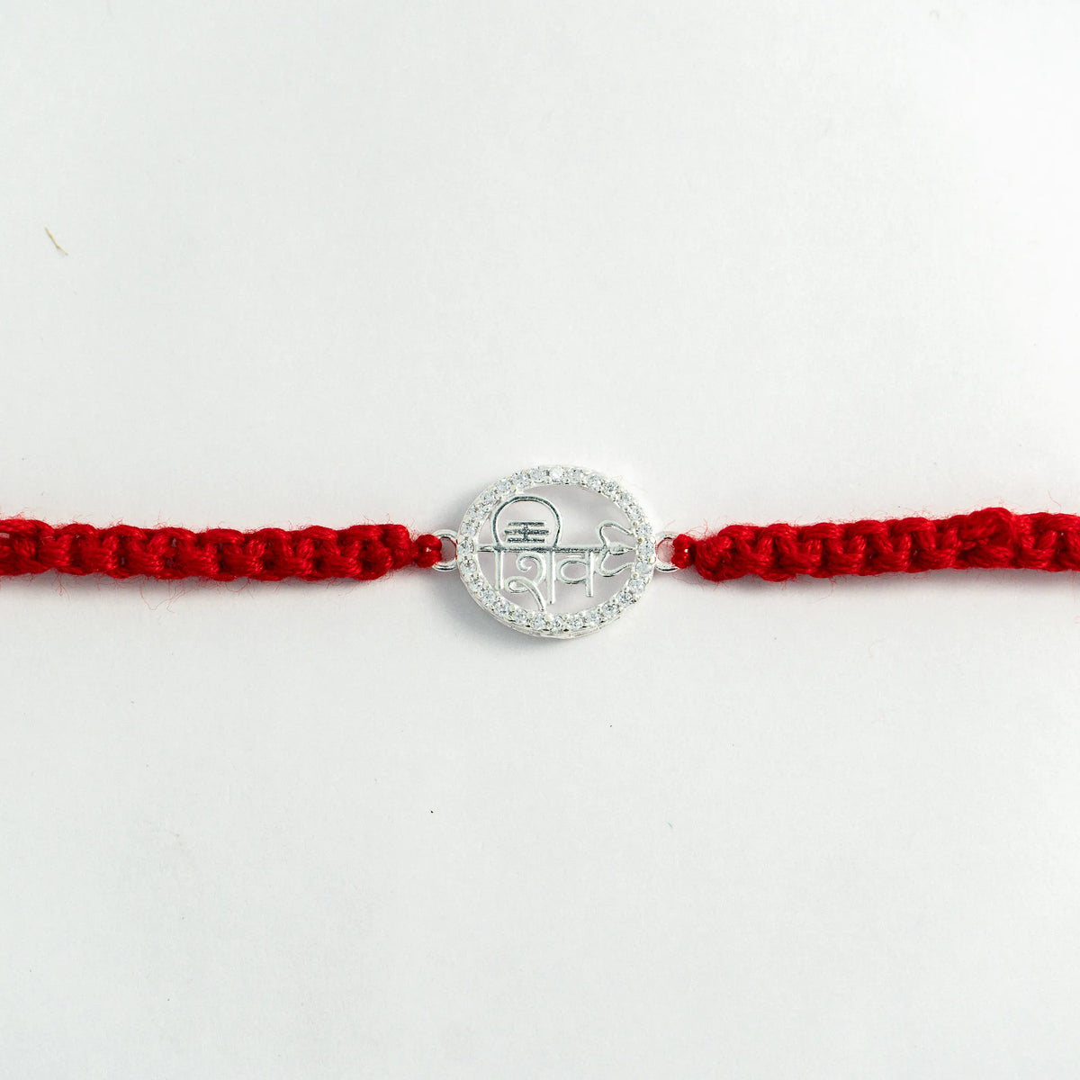 Silver Shiv Rakhi for Brother with Handcrafted Red Thread