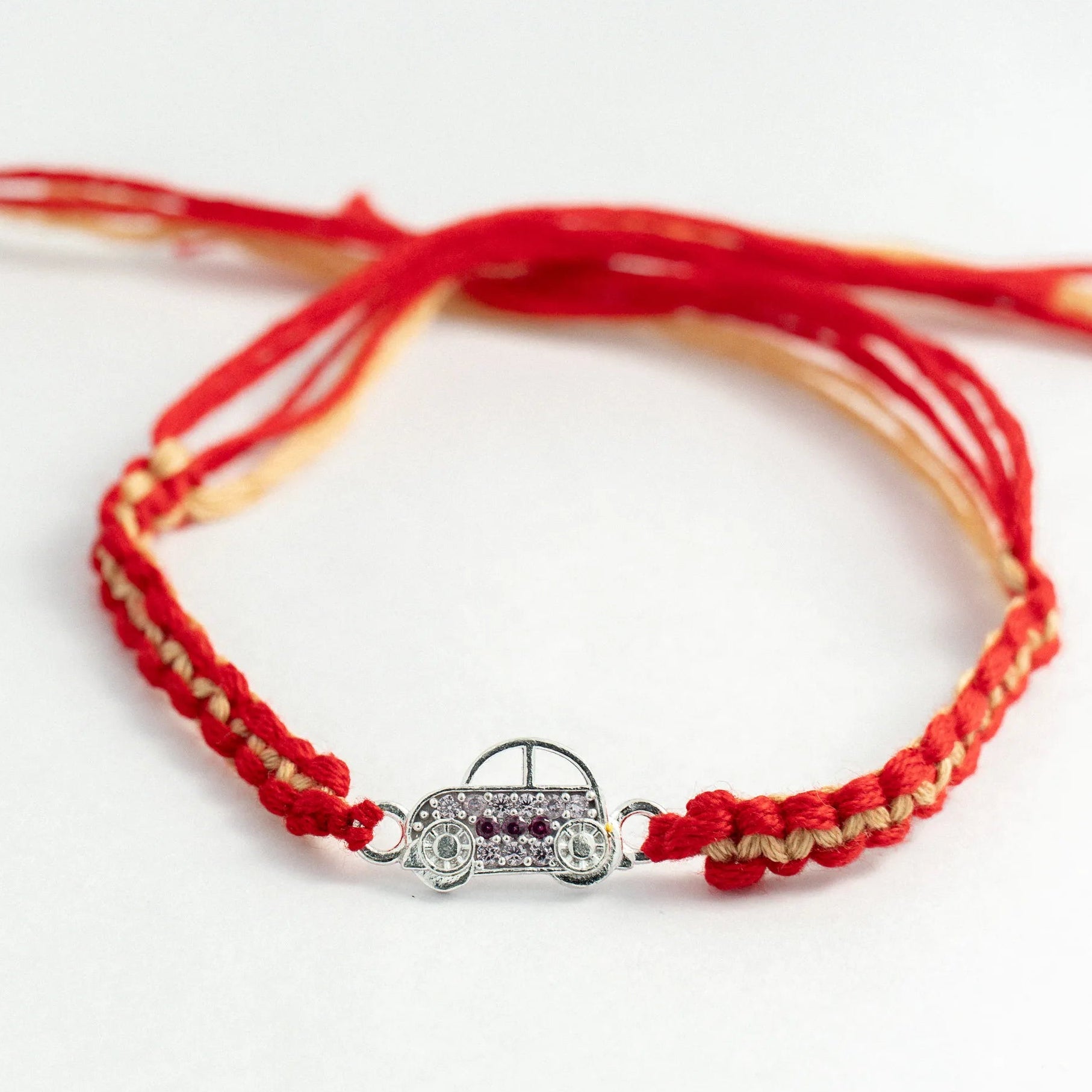 Silver Car Kids Rakhi for Brother with Handcrafted Red Thread