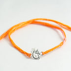 Silver Ganesha Om Rakhi for Brother with Handcrafted Orange Thread
