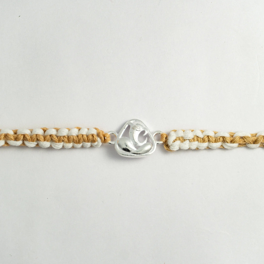 Silver Lord Ganesha Rakhi for Brother with Beige and White Handcrafted Thread