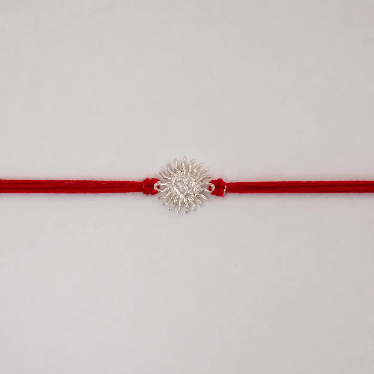 925 Sterling Silver Om Surya Rakhi for Brother with Red Thread